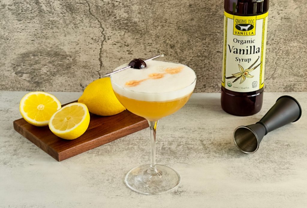 Vanilla Whiskey Sour made with Singing Dog Vanilla Syrup