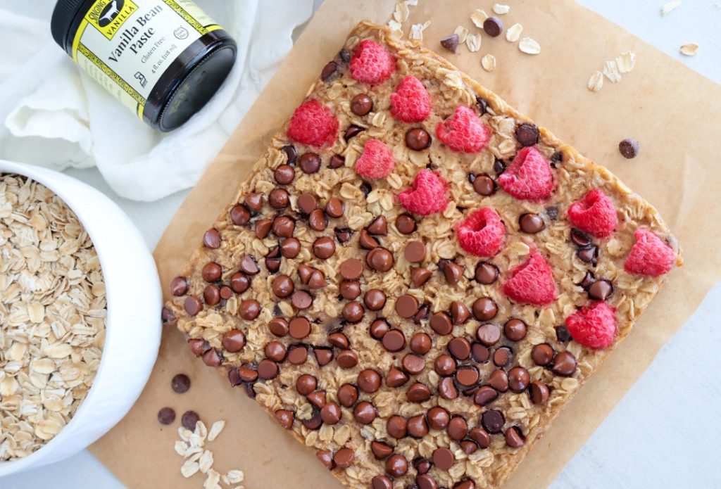 Vanilla Bean Oatmeal bars with Chocolate Chips, Raspberries and Vanilla Bean Paste from Singing Dog Vanilla